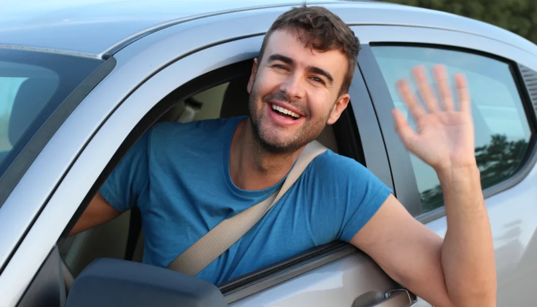 Guy looking out of driver side window