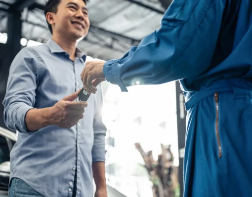 Asian Automotive Mechanic Repairman Handing Car Re 2023 11 27 04 57 14 Utc