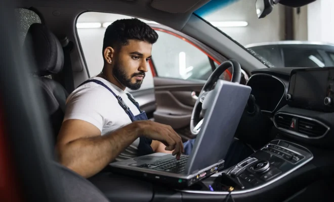 Young Bearded Man Car Technician Mechanic Sitting 2023 11 27 05 02 12 Utc
